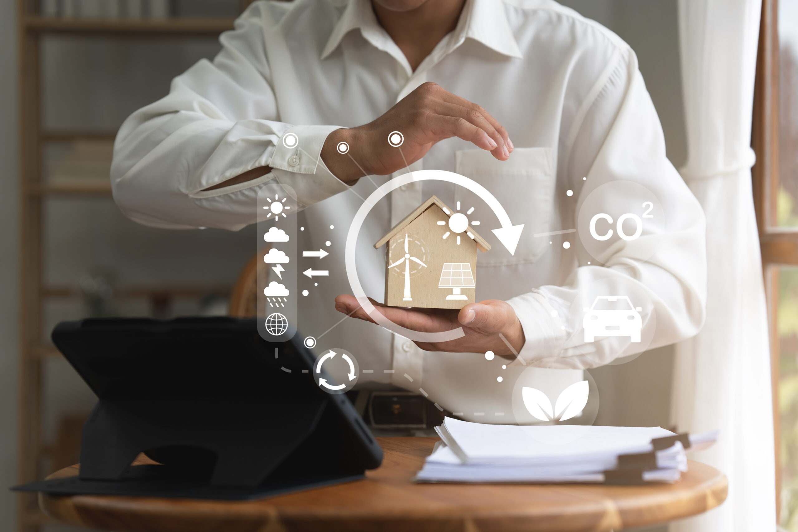 Real Estate Agent showing a energy project for future house. Green energy development concept.
