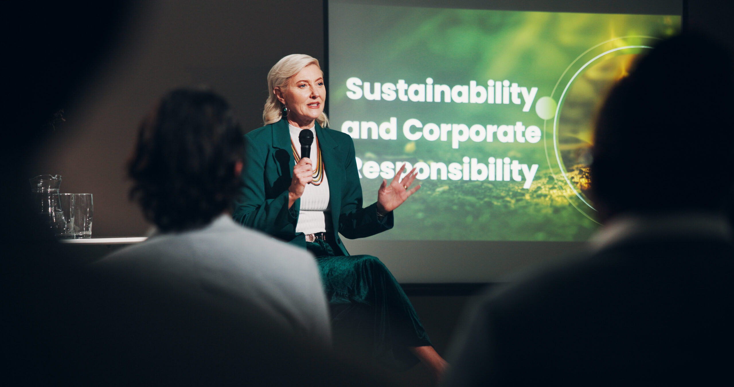 Speaker, woman and presentation for corporate responsibility or innovation seminar for employees. G.